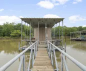 Lakefront property in a peaceful cove on Lake Eufaula. Just steps from the water
