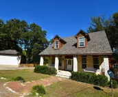 Tranquil Texoma Lake House w/ private lake on .5 acres & steps from Lake Texoma
