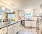Overland Park Home w/ Deck & Waterfall Pond!