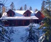 Beautiful Log Home on 5 quiet acres with private beach-steps down the road!