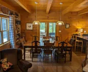 Beautiful Log Home on 5 quiet acres with private beach-steps down the road!