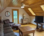 Beautiful Log Home on 5 quiet acres with private beach-steps down the road!
