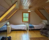 Beautiful Log Home on 5 quiet acres with private beach-steps down the road!