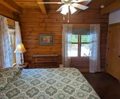 Beautiful Log Home on 5 quiet acres with private beach-steps down the road!