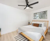 Mid Century Modern + 5min to Downtown + Walk to River + Hot Tub + Dog Friendly