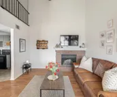 Modern city condo with Bluff Creek nature views