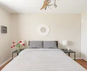 Modern city condo with Bluff Creek nature views