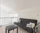Modern city condo with Bluff Creek nature views