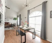 Modern city condo with Bluff Creek nature views