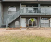 Modern city condo with Bluff Creek nature views