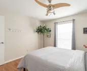 Modern city condo with Bluff Creek nature views