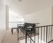 Modern city condo with Bluff Creek nature views