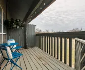 Modern city condo with Bluff Creek nature views