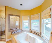 Dog-friendly golf getaway by the beach with private pool, hot tub & deck