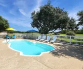 Dog-friendly golf getaway by the beach with private pool, hot tub & deck