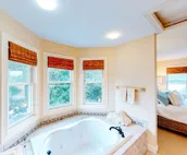 Dog-friendly golf getaway by the beach with private pool, hot tub & deck