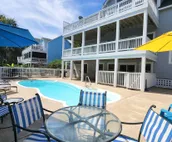 Dog-friendly golf getaway by the beach with private pool, hot tub & deck