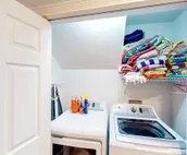Dog-friendly golf getaway by the beach with private pool, hot tub & deck
