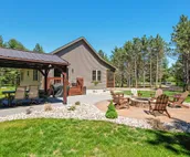 Modern cabin with fast WiFi, firepit, pergola, W/D, & central AC