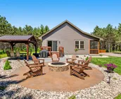 Modern cabin with fast WiFi, firepit, pergola, W/D, & central AC