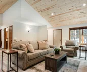 Modern cabin with fast WiFi, firepit, pergola, W/D, & central AC