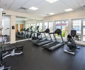 Amazing ocean & bay views from 3rd-floor condo with on-site pool & fitness ce...
