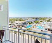 Amazing ocean & bay views from 3rd-floor condo with on-site pool & fitness ce...
