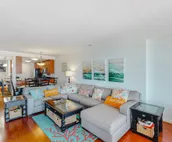 Amazing ocean & bay views from 3rd-floor condo with on-site pool & fitness ce...