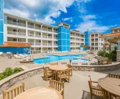 Amazing ocean & bay views from 3rd-floor condo with on-site pool & fitness ce...
