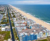 Amazing ocean & bay views from 3rd-floor condo with on-site pool & fitness ce...