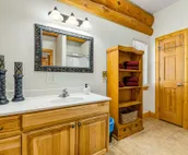 Custom cabin on 10 acres with firepit, wood stove, game room & forest views