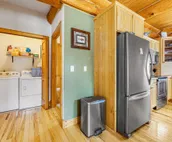 Custom cabin on 10 acres with firepit, wood stove, game room & forest views