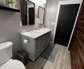Family friendly lakefront chalet with hot tub and master suite