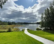 Family friendly lakefront chalet with hot tub and master suite