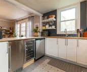 Cheerful 3 Bedroom / 2 Bathroom Bungalow w/ private Hot Tub + Private Deck/Patio