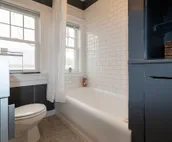 Cheerful 3 Bedroom / 2 Bathroom Bungalow w/ private Hot Tub + Private Deck/Patio