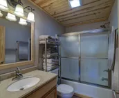 Cabin close to Nemo, private stocked pond and hot tub great for families!