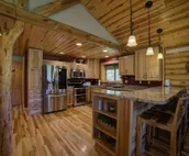Cabin close to Nemo, private stocked pond and hot tub great for families!