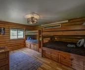 Cabin close to Nemo, private stocked pond and hot tub great for families!