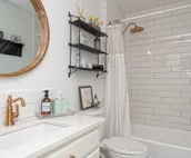4 bedroom/2.5 bath fully restored 1910 beauty minutes from KU campus & downtown.