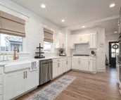 4 bedroom/2.5 bath fully restored 1910 beauty minutes from KU campus & downtown.