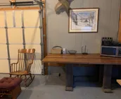 Room w/ a double bed and twin over twin bunk beds