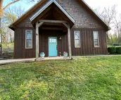 Colorado style cabin landscaped with stone walls