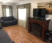 Cozy two bedroom cottage on 2 fenced in acres.
