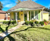 The Yellow Cottage with an Inviting Hot Tub