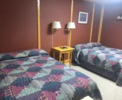 Two double beds in hotel like quarters