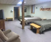 A room with 5 single beds