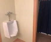Room w/ a double bed and twin over twin bunk beds