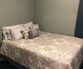 Cozy two bedroom cottage on 2 fenced in acres.