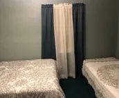 Cozy two bedroom cottage on 2 fenced in acres.